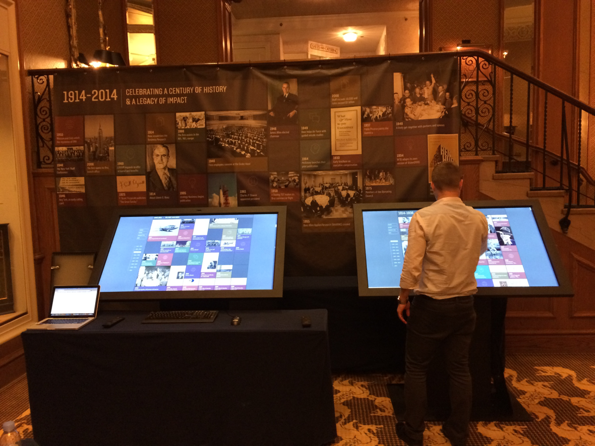 Strategy& history exhibit with two interactive timeline touchscreen stations